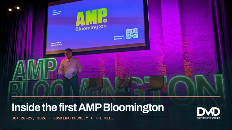 Stage at the Buskirk-Chumley Theater with large illuminated AMP Bloomington letters, purple brick backdrop and the title Inside the first AMP Bloomington